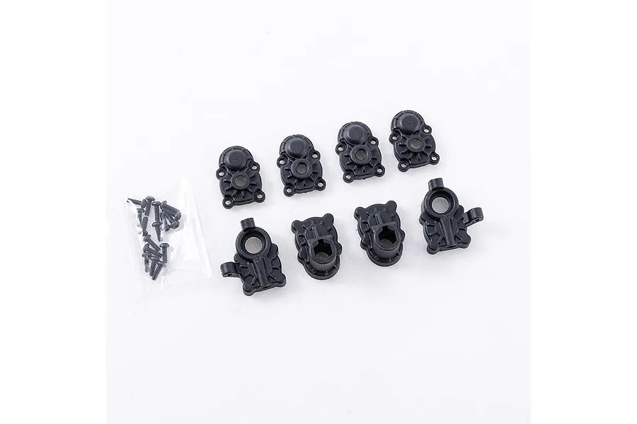 FMS V2 front portal axle cover set including eight black plastic components and a small bag of screws on a white background.