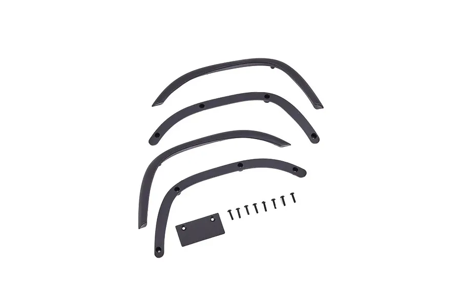 A set of four black plastic RC fender flares, a small rectangular plate, and eight small mounting screws arranged on a white background.