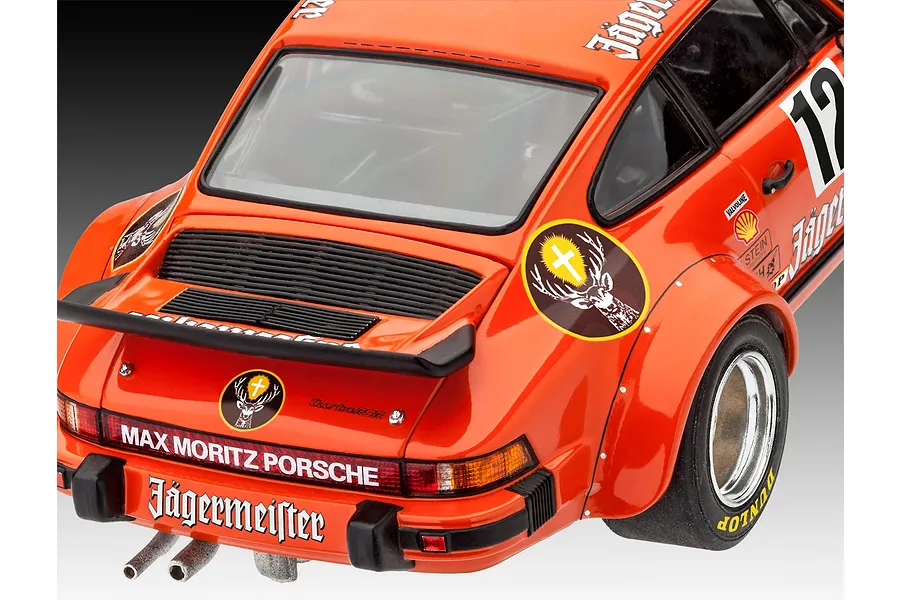 Rear view of a 1/24 scale Porsche 934 RSR Jägermeister model car showing the rear spoiler, engine vents, and racing decals.