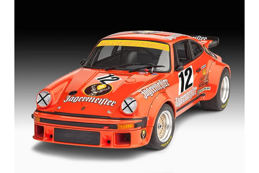 A 1/24 scale model of a Porsche 934 RSR in Jägermeister orange livery with racing number 12, displayed on a gradient background.