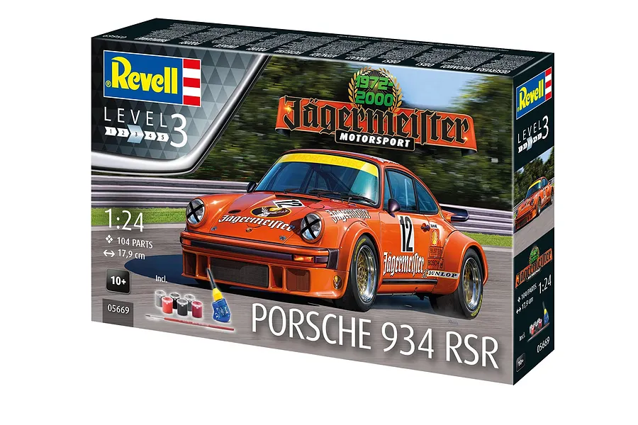 Revell 1/24 scale Porsche 934 RSR Jägermeister model kit box featuring an orange race car illustration, paint pots, and a brush.