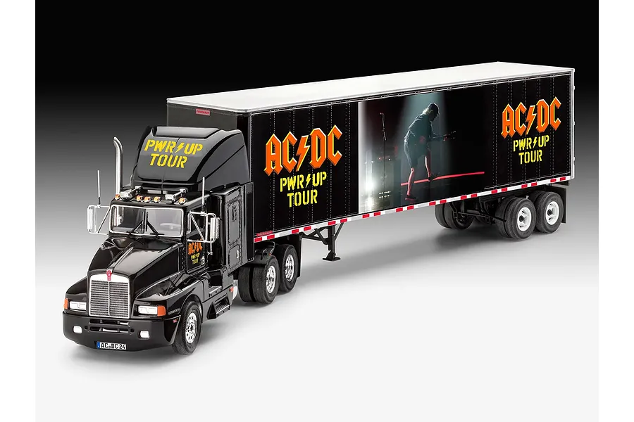 A 1/32 scale model of a black Kenworth semi-truck featuring AC/DC Power Up Tour branding on the cab and trailer.