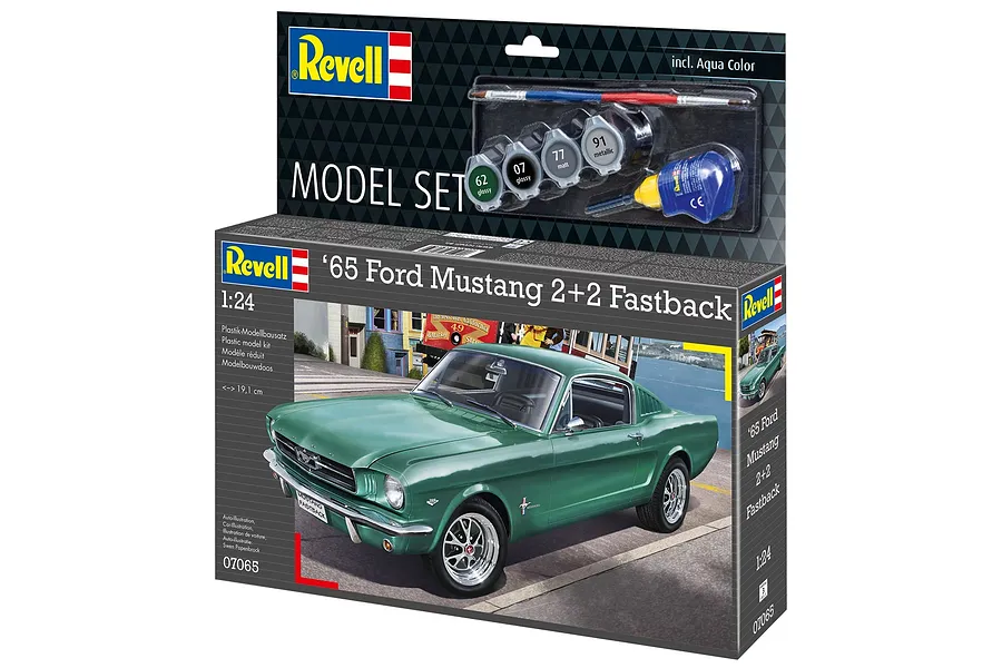 Revell 1/24 scale 1965 Ford Mustang 2+2 Fastback model kit box showing a green car illustration and included paints and glue.