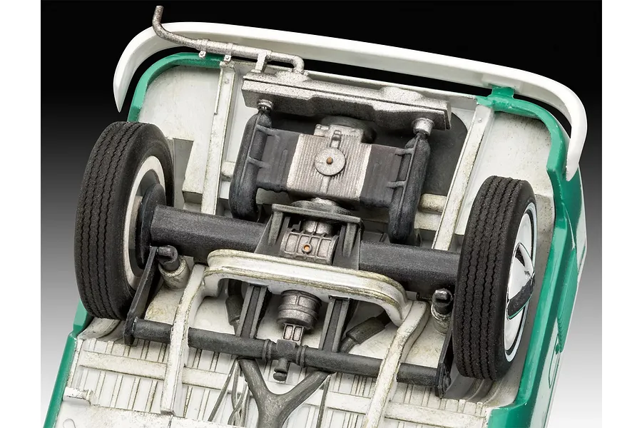 Underside view of a 1/24 scale Revell VW T1 Bus model kit showing detailed chassis, engine, and suspension components.
