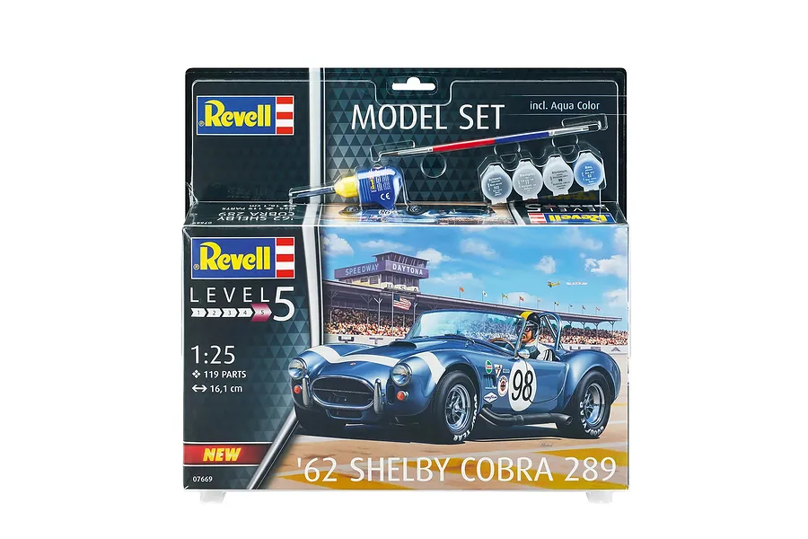 Revell 1/25 scale '62 Shelby Cobra 289 model kit in its original retail packaging, including paint, glue, and a brush.