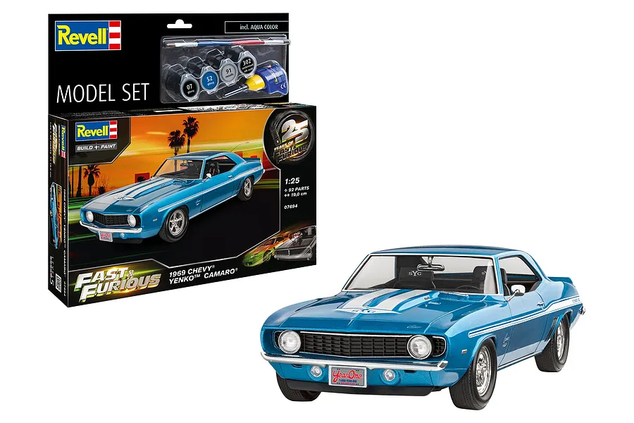 Revell 1/25 scale Fast &amp; Furious 1969 Chevy Camaro Yenko model kit box and a fully assembled blue model car on a white background.