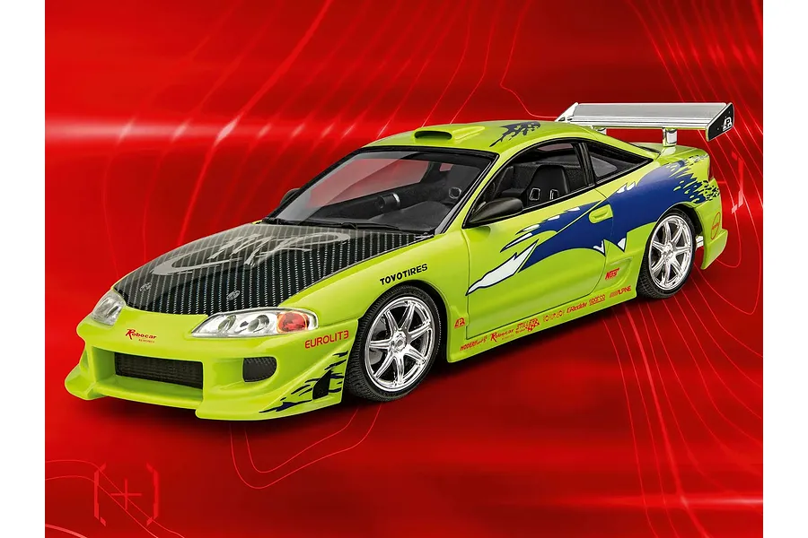 A 1/25 scale plastic model of Brian's lime green 1995 Mitsubishi Eclipse from Fast &amp; Furious, featuring blue decals and a carbon fiber hood.