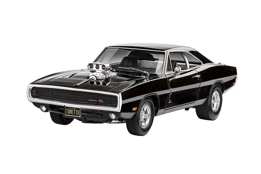 A 1/25 scale model of Dominic Toretto's black 1970 Dodge Charger R/T from Fast &amp; Furious, featuring a prominent chrome supercharger protruding from the hood.