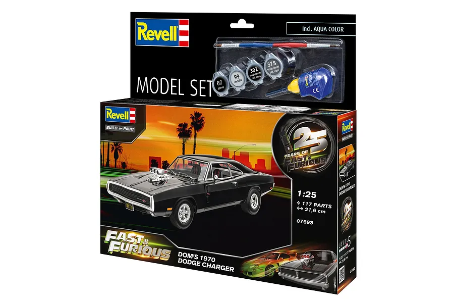 Revell 1/25 scale Fast &amp; Furious 1970 Dodge Charger model kit box showing the finished black car model, paint pots, glue, and brush.