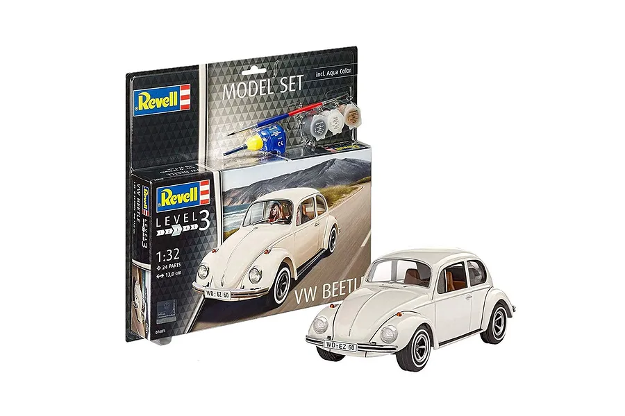 Revell 1/32 scale VW Beetle plastic model kit in its retail packaging, displayed next to a fully assembled and painted white model car.