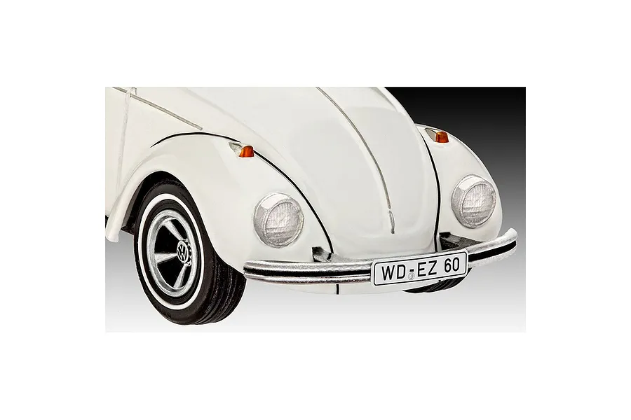 Close-up of the front end of a white scale model Volkswagen Beetle with a license plate reading WD-EZ 60.