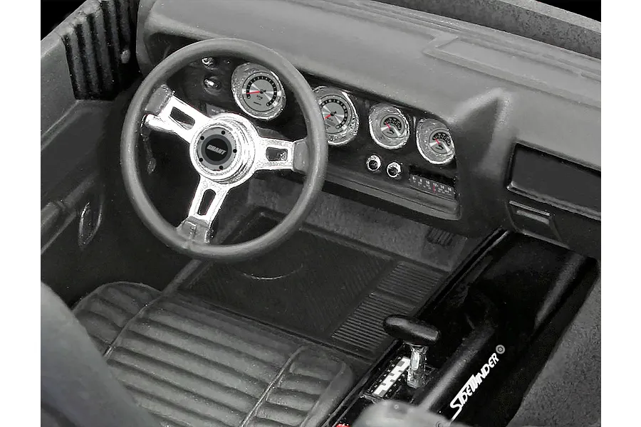 A detailed interior view of a 1/24 scale model car, showing a dashboard, steering wheel with Grant logo, and center console with Sidewinder shifter.