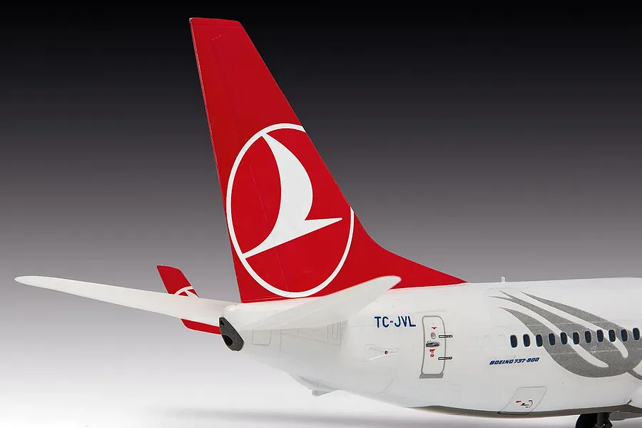 Close-up of the tail section of a Revell 1/144 scale Boeing 737-800 model aircraft in Turkish Airlines livery.