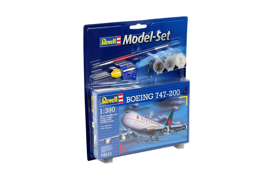 Revell 1/390 Boeing 747-200 model kit in blister packaging with included paint, glue, and brush.