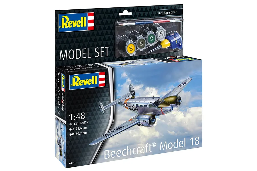 Revell 1/48 scale Beechcraft Model 18 plastic model aircraft kit box with included paints, brush, and glue.
