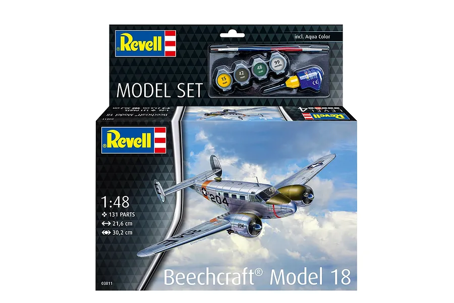 Revell 1/48 scale Beechcraft Model 18 plastic model kit box featuring an illustration of the aircraft in flight, including paint and glue.