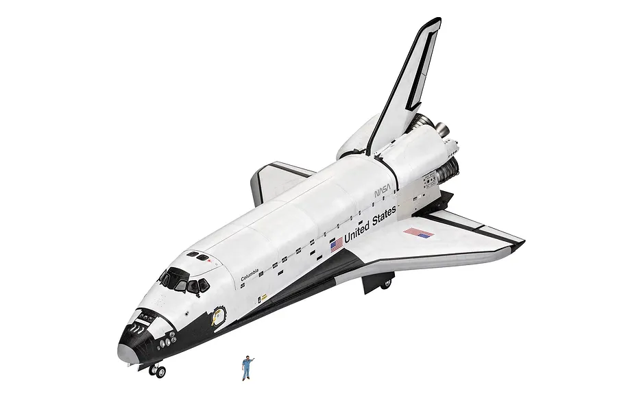 A high-angle studio shot of a completed Revell 1/72 scale Space Shuttle Columbia model with a small scale figure standing in front for size comparison.
