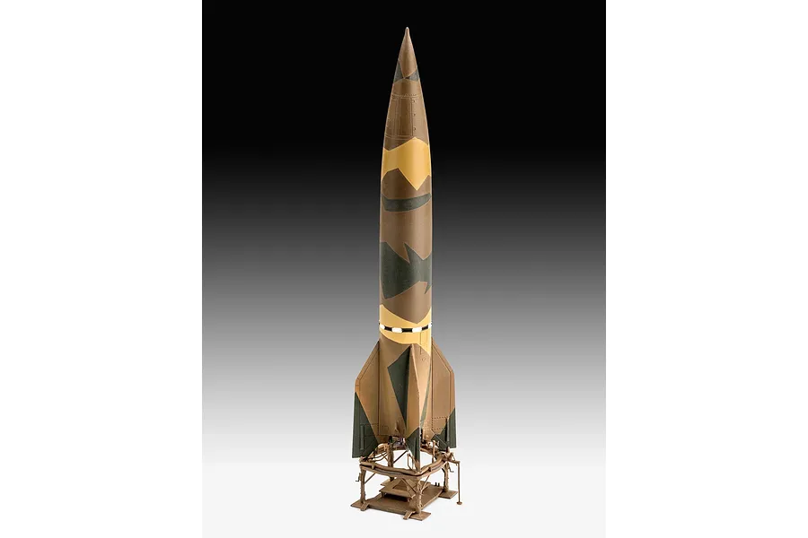 A 1/72 scale plastic model of a German A4-V2 rocket standing upright on its launch platform, featuring a brown, tan, and dark green camouflage pattern.