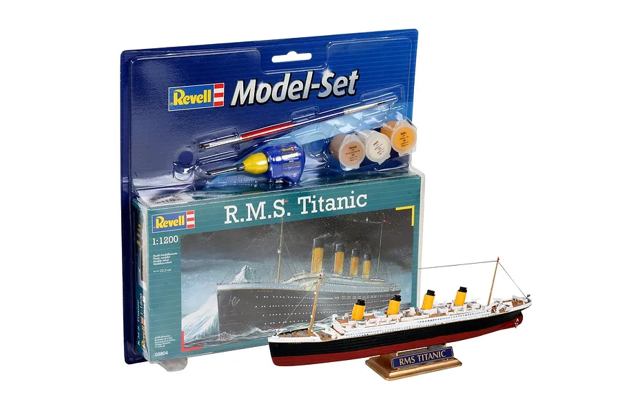 Revell 1/1200 scale R.M.S. Titanic model starter kit in blister packaging with a fully assembled and painted model ship displayed in front.