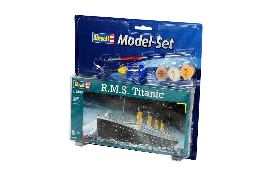 Revell 1/1200 scale R.M.S. Titanic plastic model starter kit in blister packaging with included paint, glue, and brush.