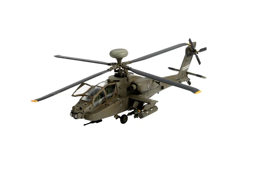 A fully assembled 1/144 scale Revell AH-64D Apache Longbow model helicopter painted in olive drab military camouflage.