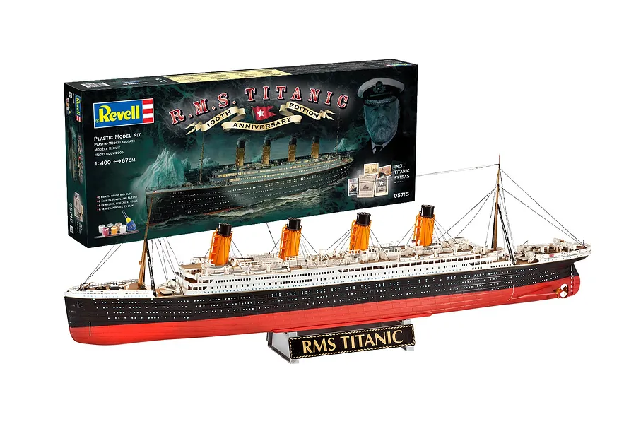 A Revell 1/400 scale RMS Titanic 100th Anniversary model kit box behind a fully assembled and painted model ship on a display stand.