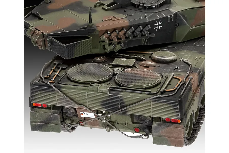 Close-up of a 1/35 scale Revell Leopard 2 A6 tank model showing the rear deck, engine vents, and turret camouflage detail.
