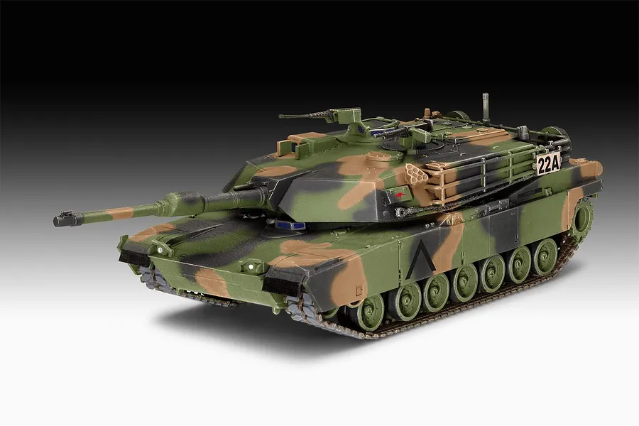 A 1/72 scale plastic model of an M1A1 Abrams tank painted in a three-tone camouflage scheme with Australian Army markings.