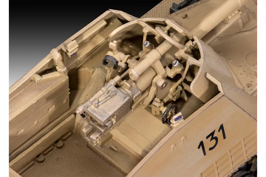 Close-up of the detailed interior gun compartment of a 1/72 scale plastic model Sd.Kfz. 164 Nashorn tank destroyer.