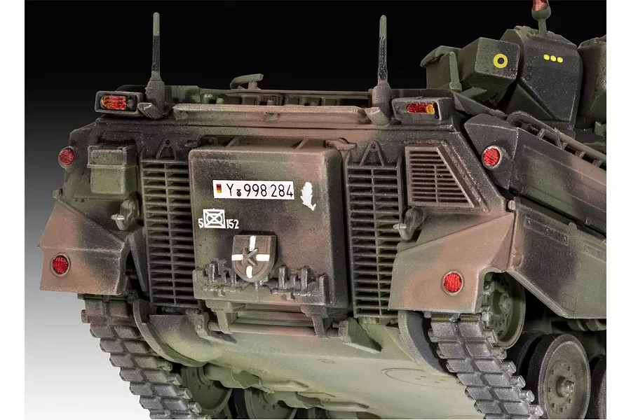 Rear view of a 1/72 scale plastic model of a German SPz Marder 1A3 infantry fighting vehicle with camouflage paint.