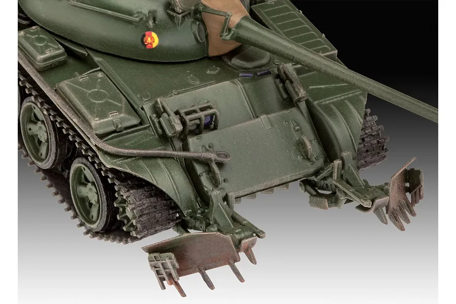 Close-up of a 1/72 scale T-55A tank model with a KMT-6 mine plow attachment, featuring green camouflage and East German markings.