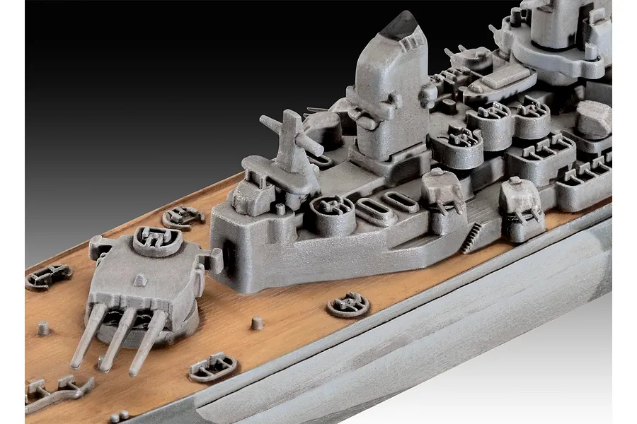 Close-up of a 1/1200 scale USS New Jersey battleship model showing the deck, main gun turret, and superstructure details.