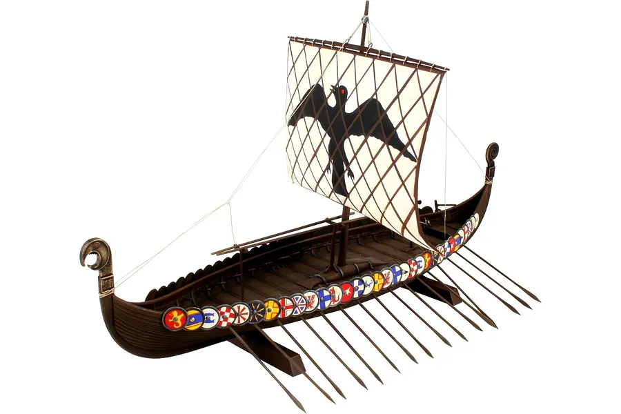 A fully assembled 1/50 scale Revell Viking ship plastic model kit featuring a square sail with a black bird emblem and colorful shields along the hull.