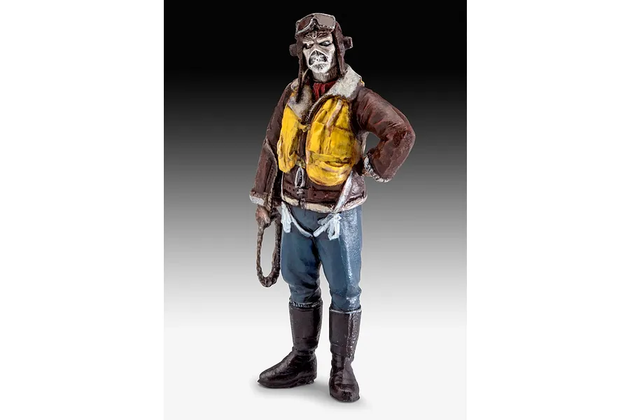A painted 1/32 scale plastic model figure of Eddie from Iron Maiden dressed as a WWII fighter pilot, standing against a grey gradient background.