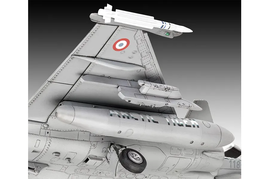 Close-up of a 1/48 scale Dassault Rafale C model aircraft showing the wing, missile, and Arctic Tiger fuel tank.