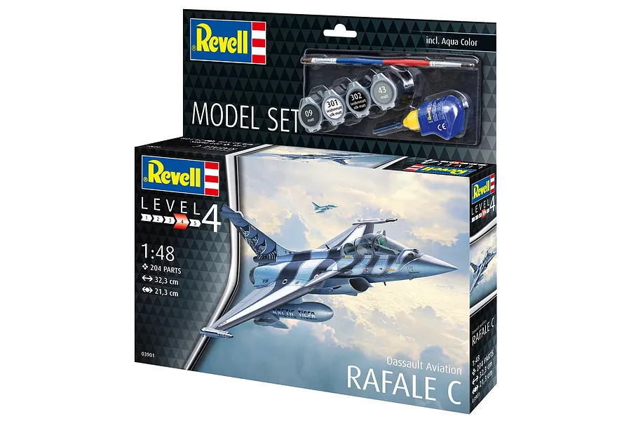 Revell 1/48 scale Dassault Rafale C plastic model kit box showing the finished aircraft in flight and included paints and glue.