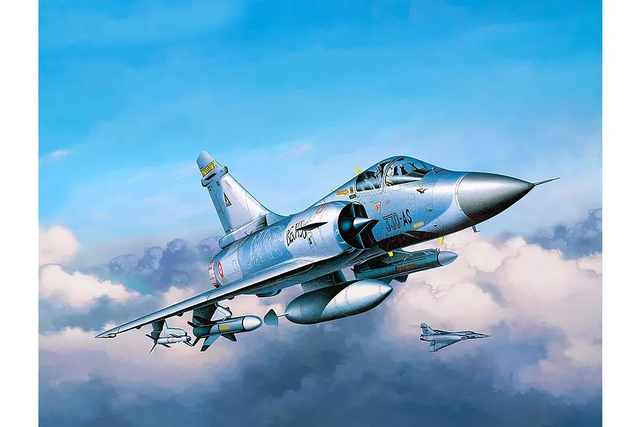 Box art illustration of a Dassault Mirage 2000 C fighter jet flying through a cloudy sky, with a second smaller jet in the distance.