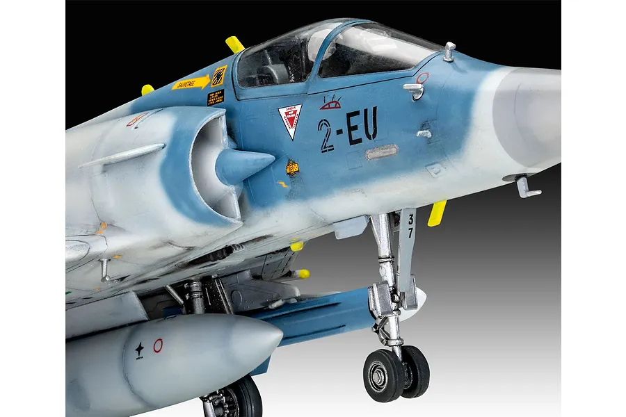 Close-up of a 1/48 scale Revell Dassault Mirage 2000 C plastic model aircraft showing the cockpit, nose, and landing gear.