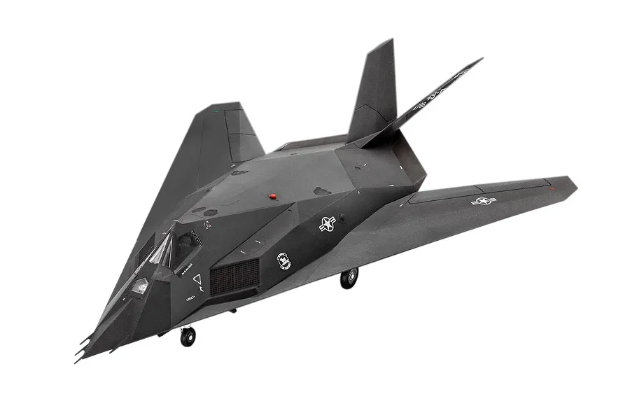 A fully assembled and painted 1/72 scale plastic model of an F-117 Nighthawk stealth aircraft, shown from a high-angle perspective against a white background.