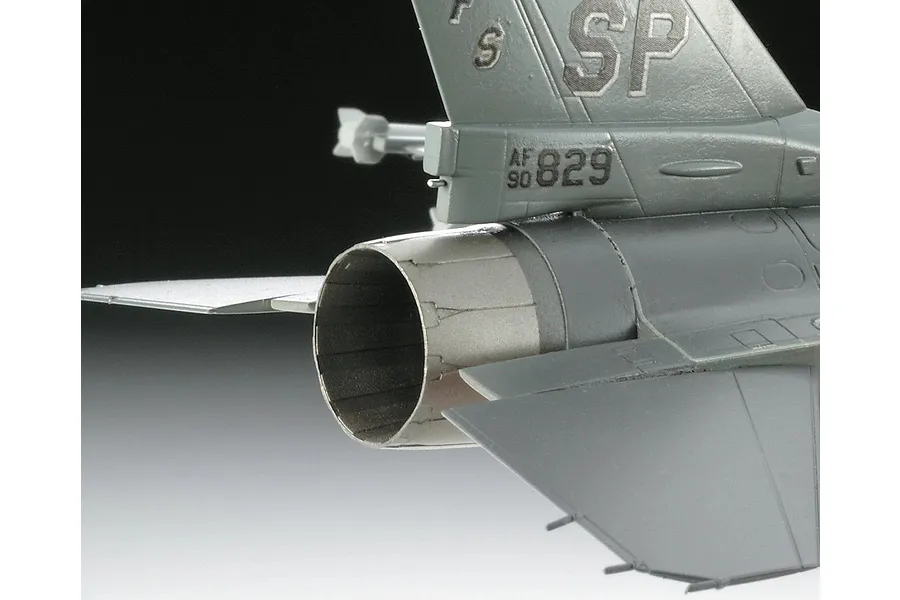 Close-up of the rear exhaust nozzle and tail section of a grey F-16 Fighting Falcon plastic model aircraft.