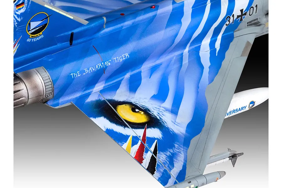 Close-up of the tail section of a Revell 1/72 Eurofighter Typhoon model featuring a blue tiger eye design and Bavarian Tiger 2021 markings.