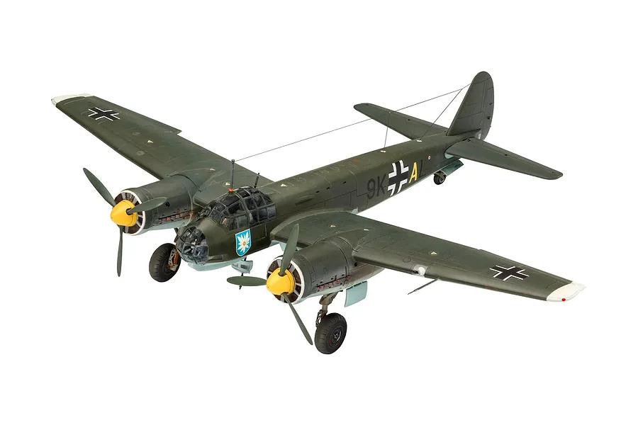 A fully assembled and painted 1/72 scale plastic model of a Junkers Ju88 A-1 bomber in dark green camouflage with yellow propeller spinners.