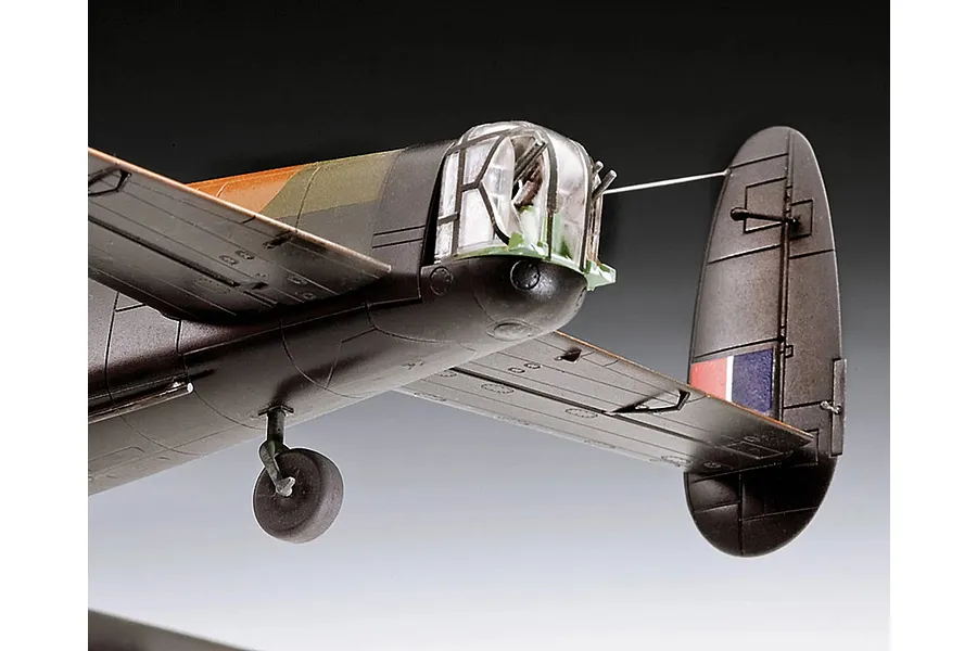 Close-up of the rear fuselage and tail section of a 1/72 scale plastic model Avro Lancaster bomber, showing the gun turret and tail fin.