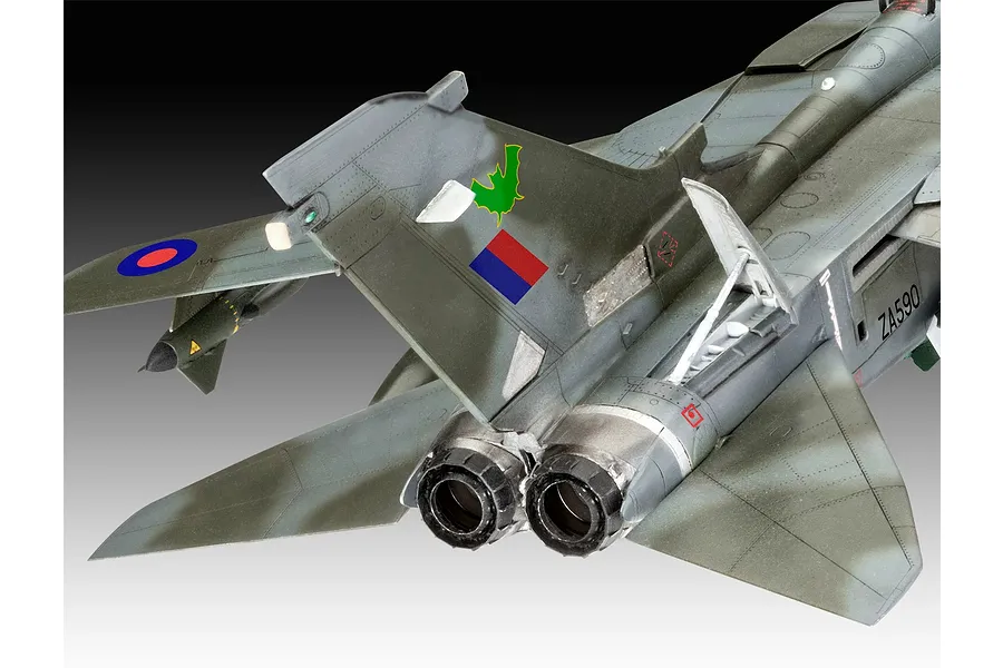 Close-up of the rear section of a 1/72 scale Panavia Tornado model aircraft, showing the twin exhaust nozzles, vertical stabilizer, and camouflage paint scheme.