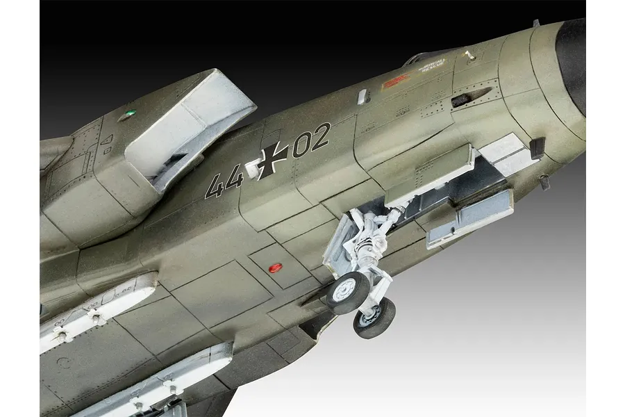 Close-up of the underside of a 1/72 scale Panavia Tornado model aircraft showing landing gear and German Air Force markings.