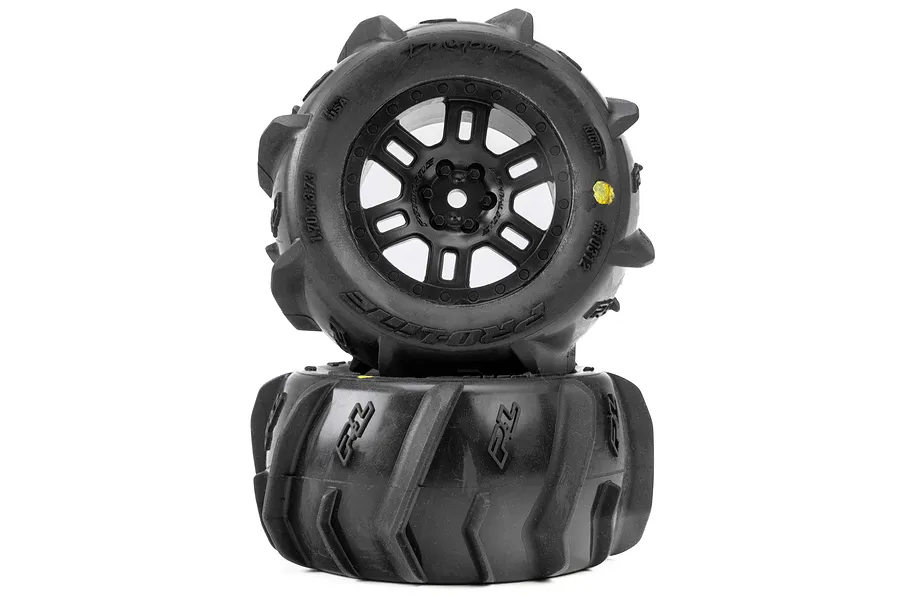 Two Pro-Line 1/16 Dumont MT paddle tyres pre-mounted on black split-six RC wheels, stacked vertically against a white background.
