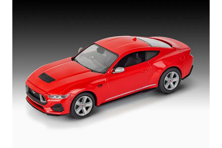 A high-angle studio shot of a red 1/25 scale Revell 2024 Ford Mustang GT model car on a gradient background.
