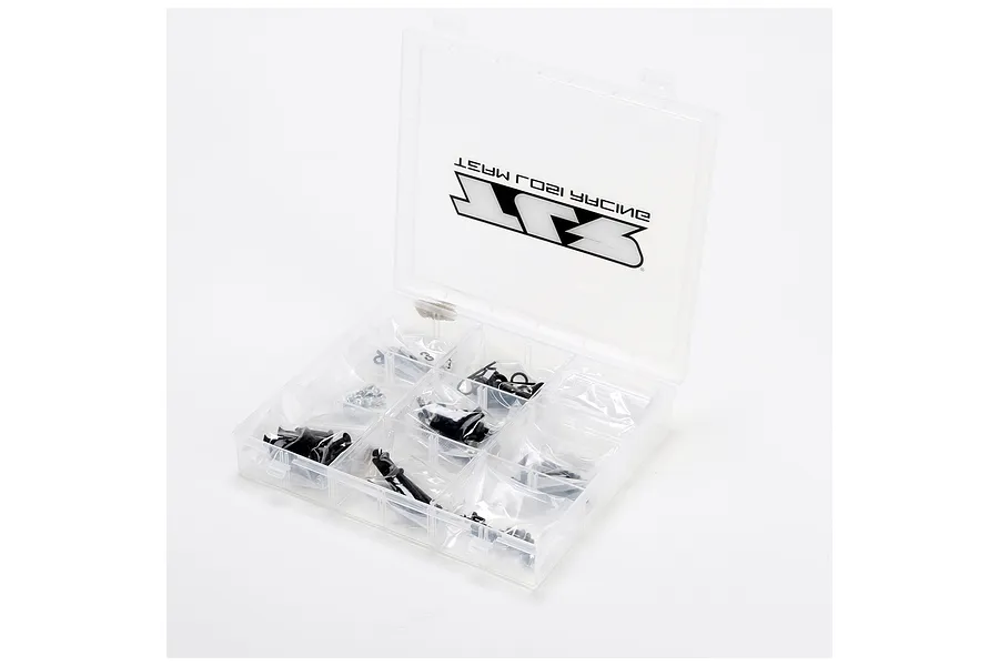 A clear plastic hardware storage box from TLR containing various small RC screws and parts in individual compartments.