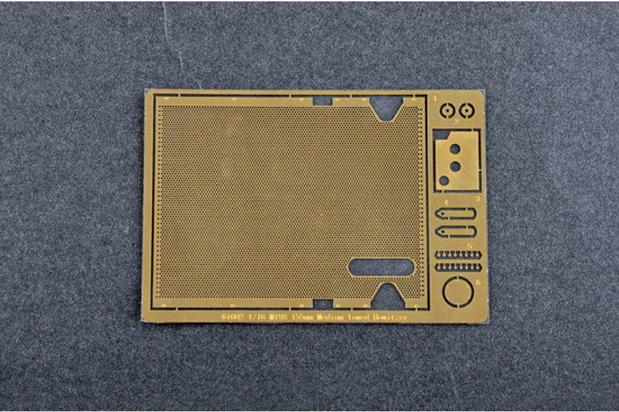 A photo-etched brass detail sheet for the I Love Kit 1/16 M198 155mm Towed Howitzer model kit, featuring mesh patterns and various small parts.