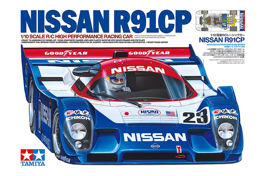 Box art for the Tamiya Nissan R91CP 1/10 scale RC car kit, featuring a detailed illustration of the blue, white, and red racing car.